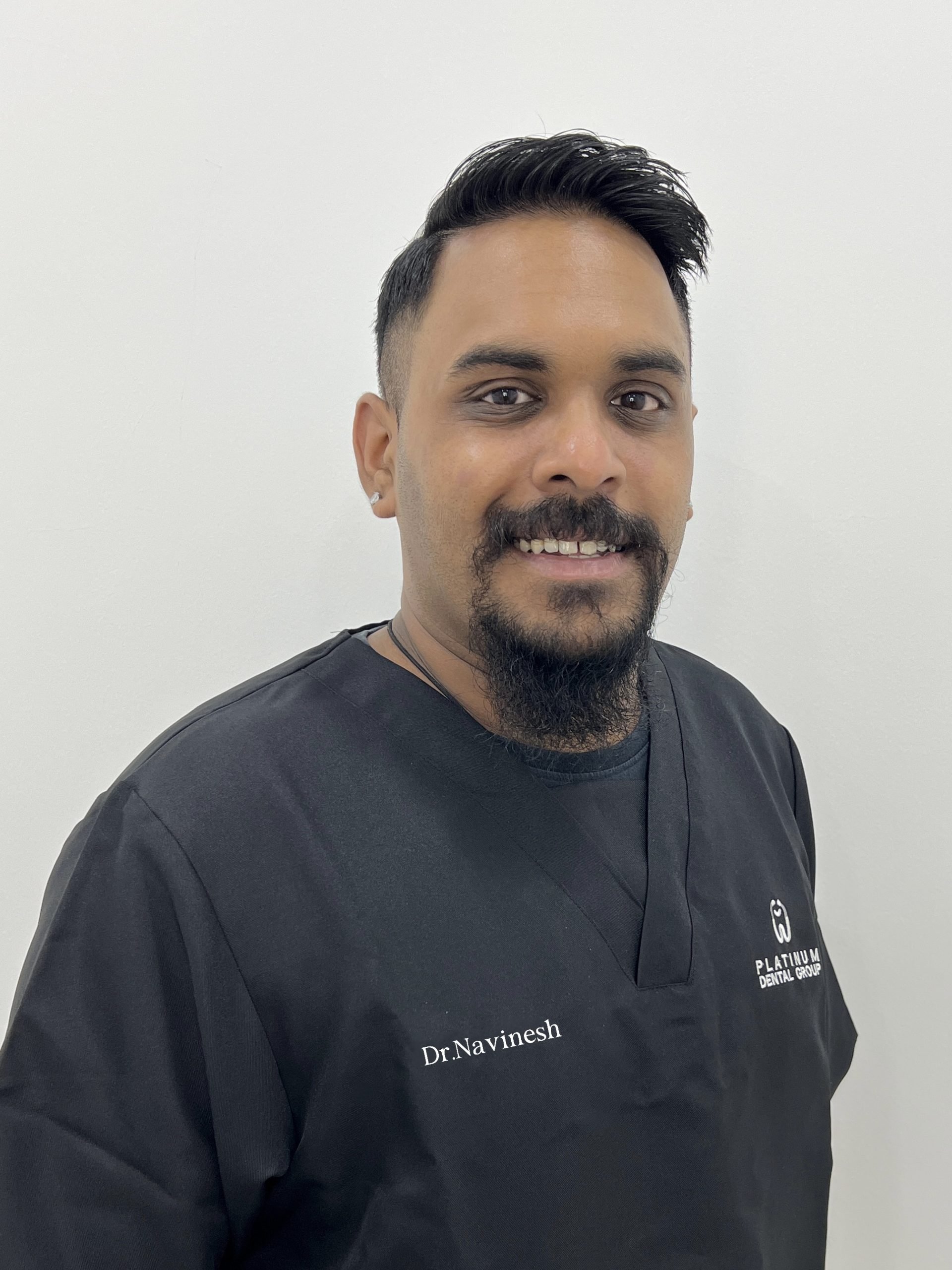 Dr Navinesh L.